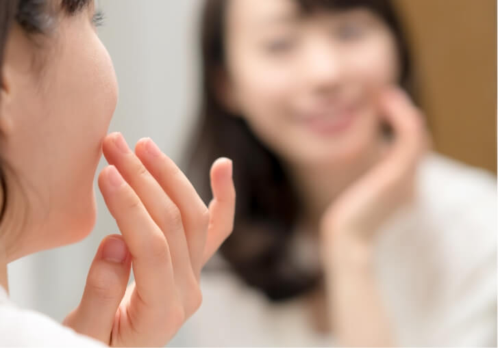 college student doing skin care