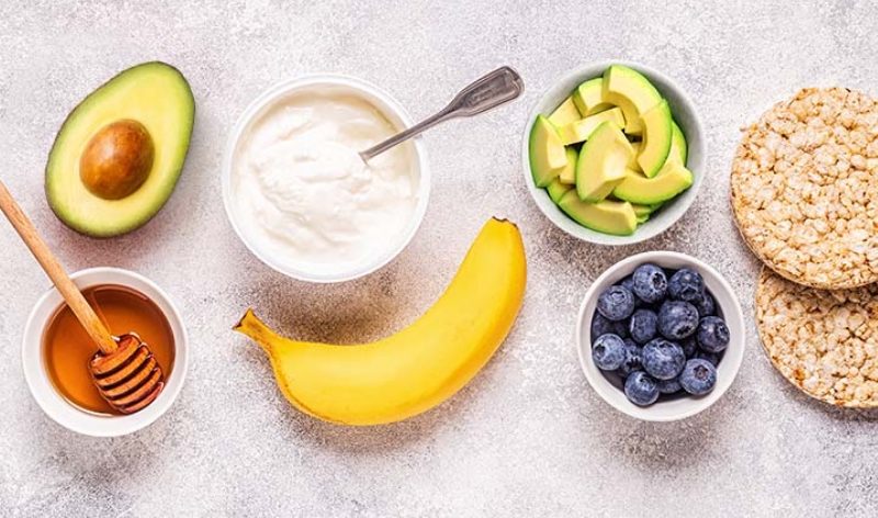 Honey, banana, avocado, and rice cakes