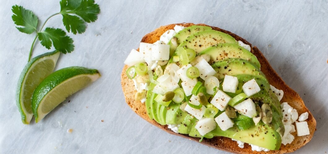Sliced Avocado on an Open Faced Sandwich avocado on an open-faced sandwich