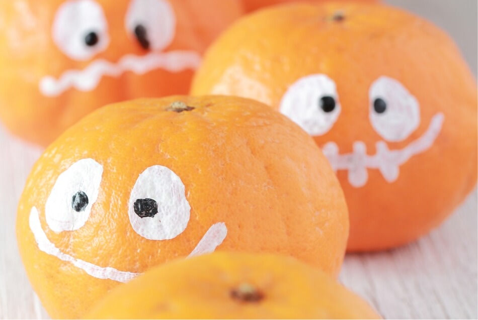 non-candy halloween jack-o-lantern oranges