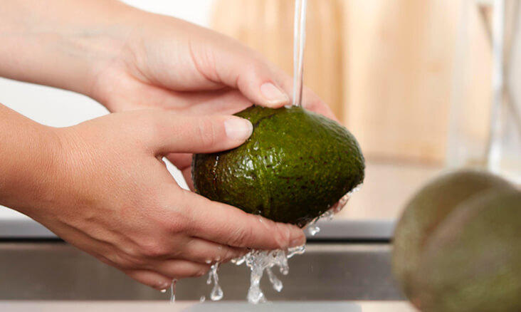 First Step to making Guacamole is to wash the avocados