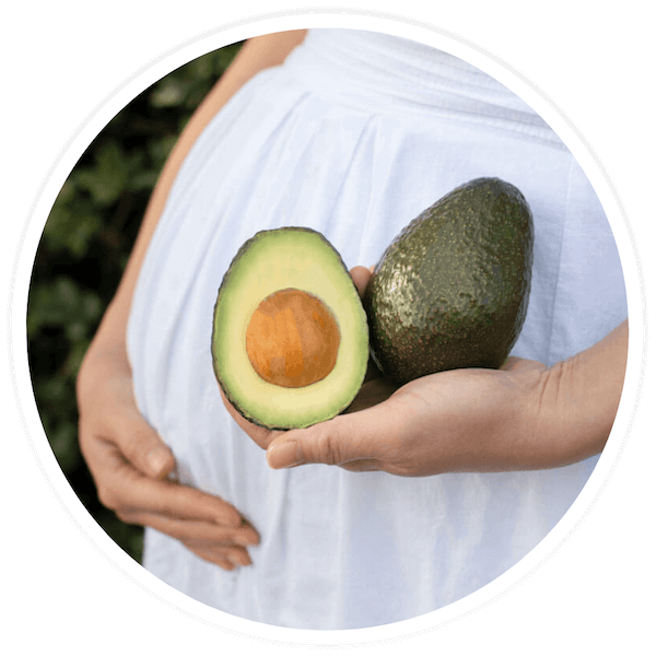 pregnant woman with avocado