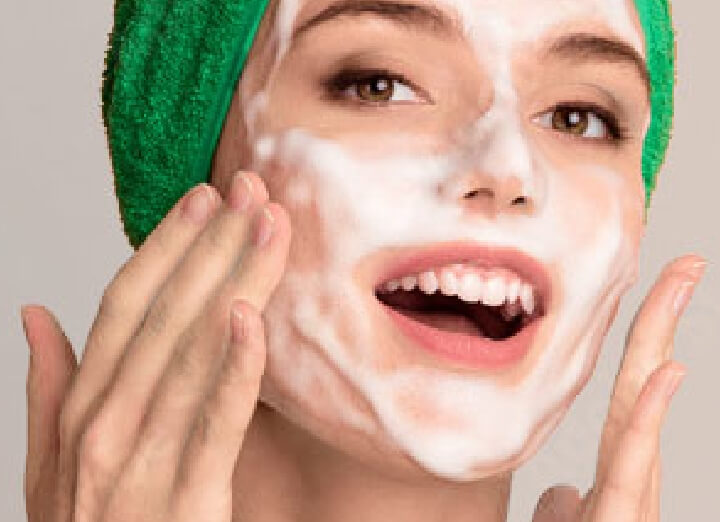 college student doing skin care